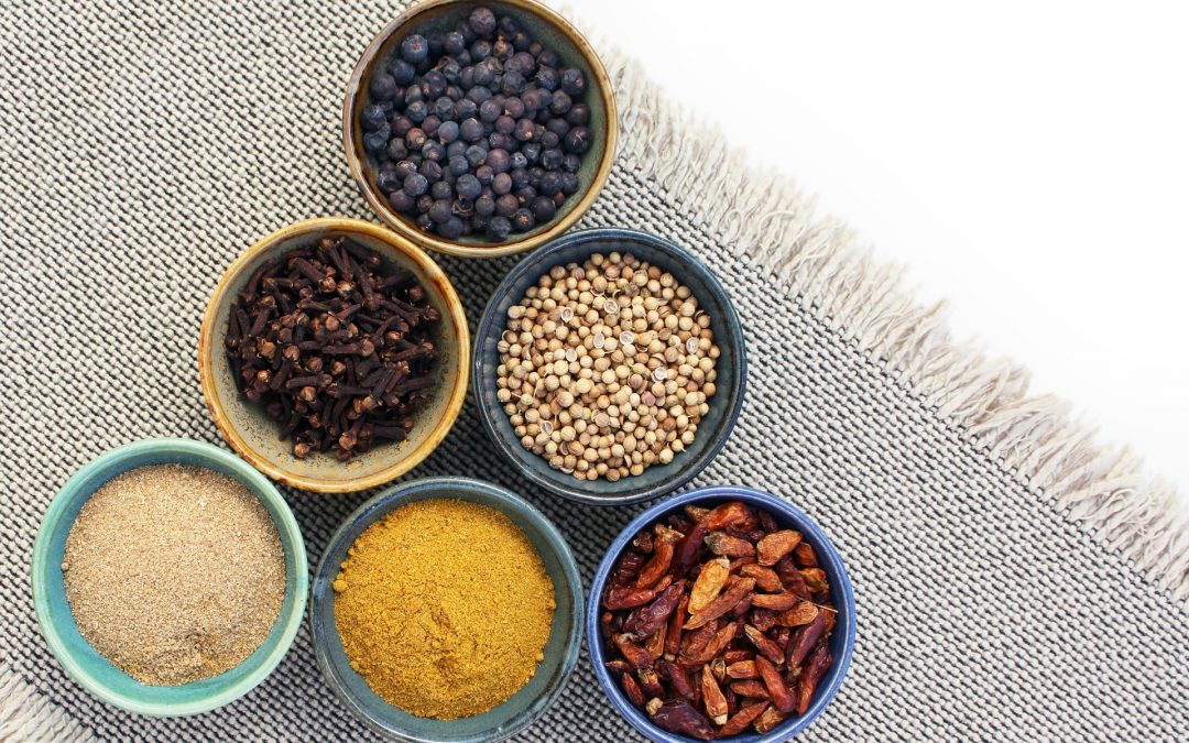 various spices in bowls