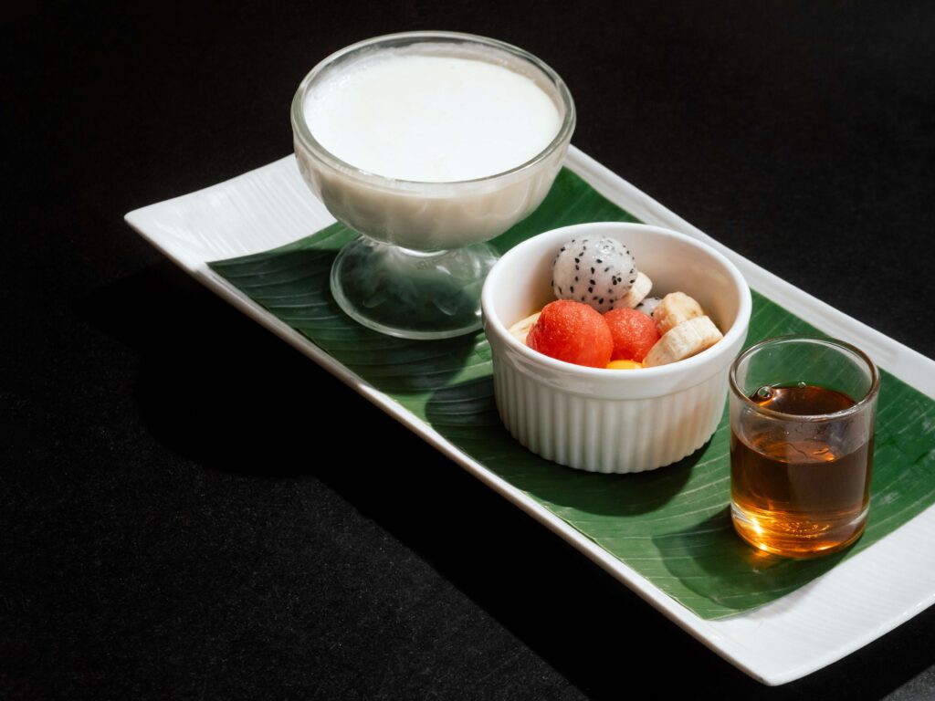 Yoghurt with fresh seasonal fruits for a light dessert at Indulge Bangkok