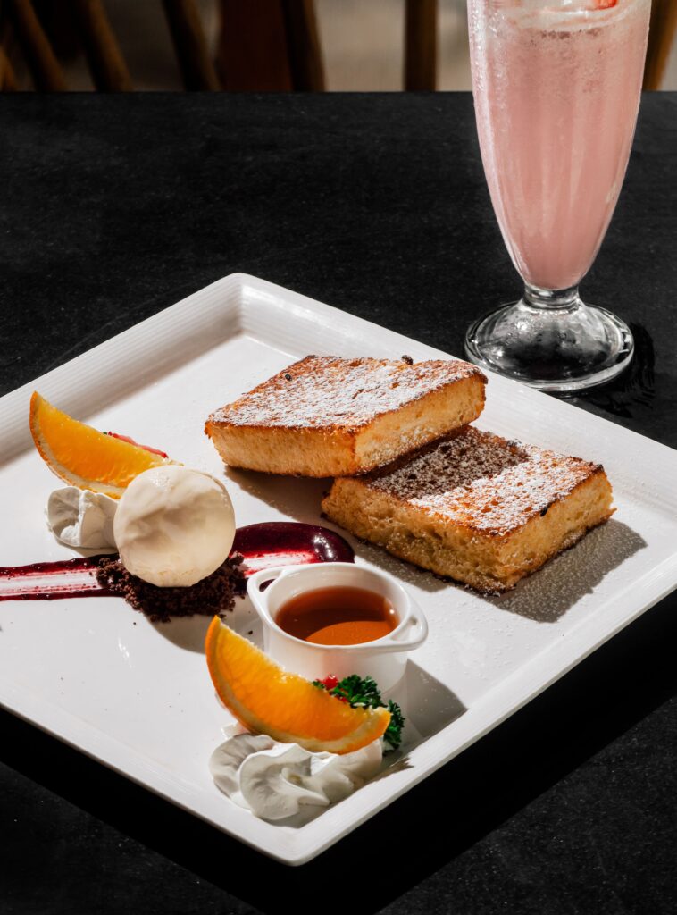 Mixed Berries French Toast with cinnamon, vanilla, berries and whipped cream