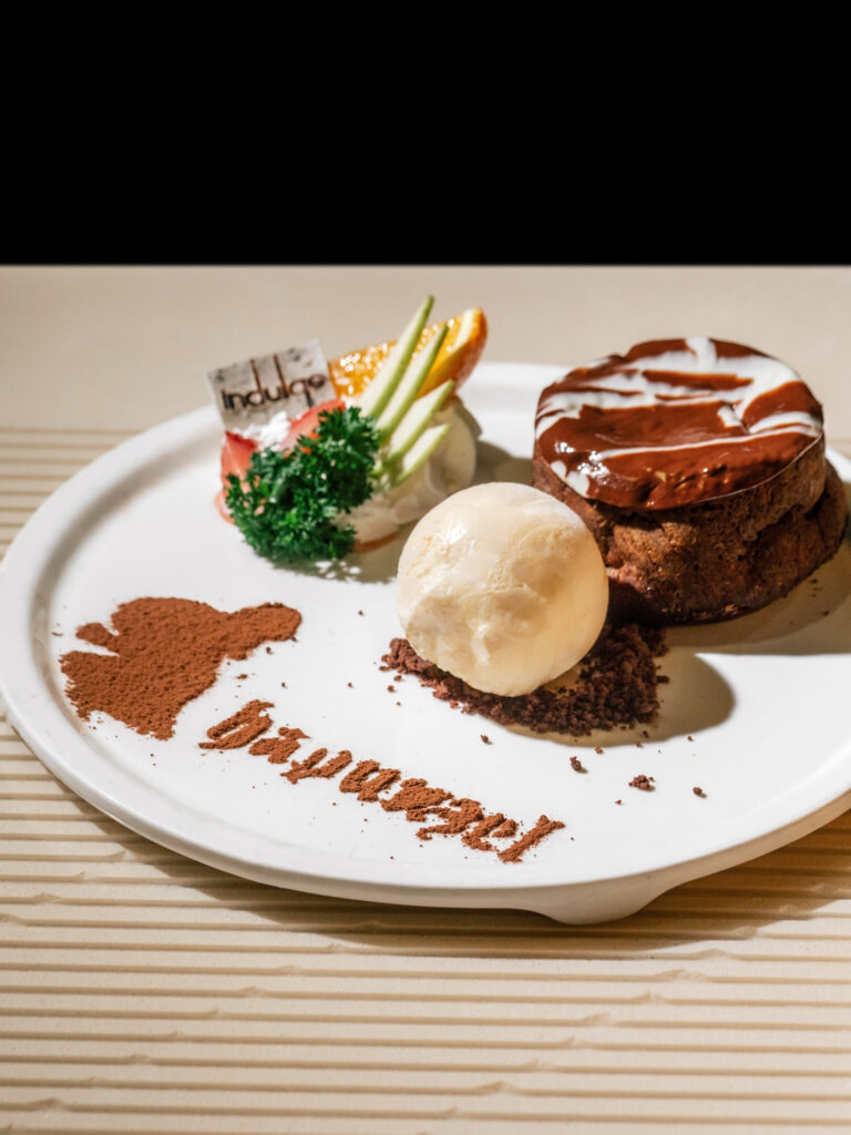 Princess Ha-Pun-Zel hazelnut chocolate lava cake with caramelised banana and vanilla ice cream