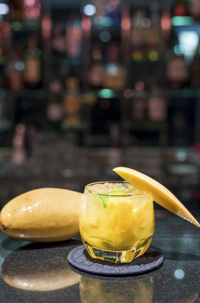 Mango Caipirinha with fresh mango and lime at Indulge Bangkok
