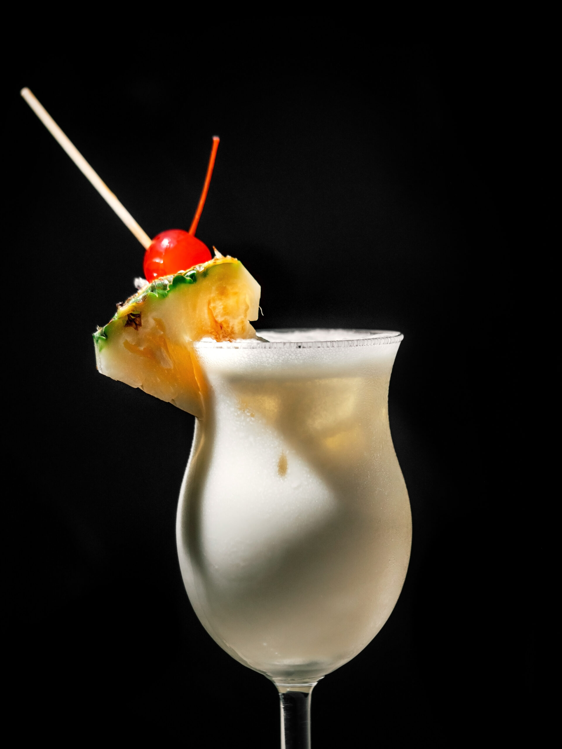Piña Colada with rum, coconut cream and pineapple juice